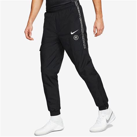 nike fc track pants.